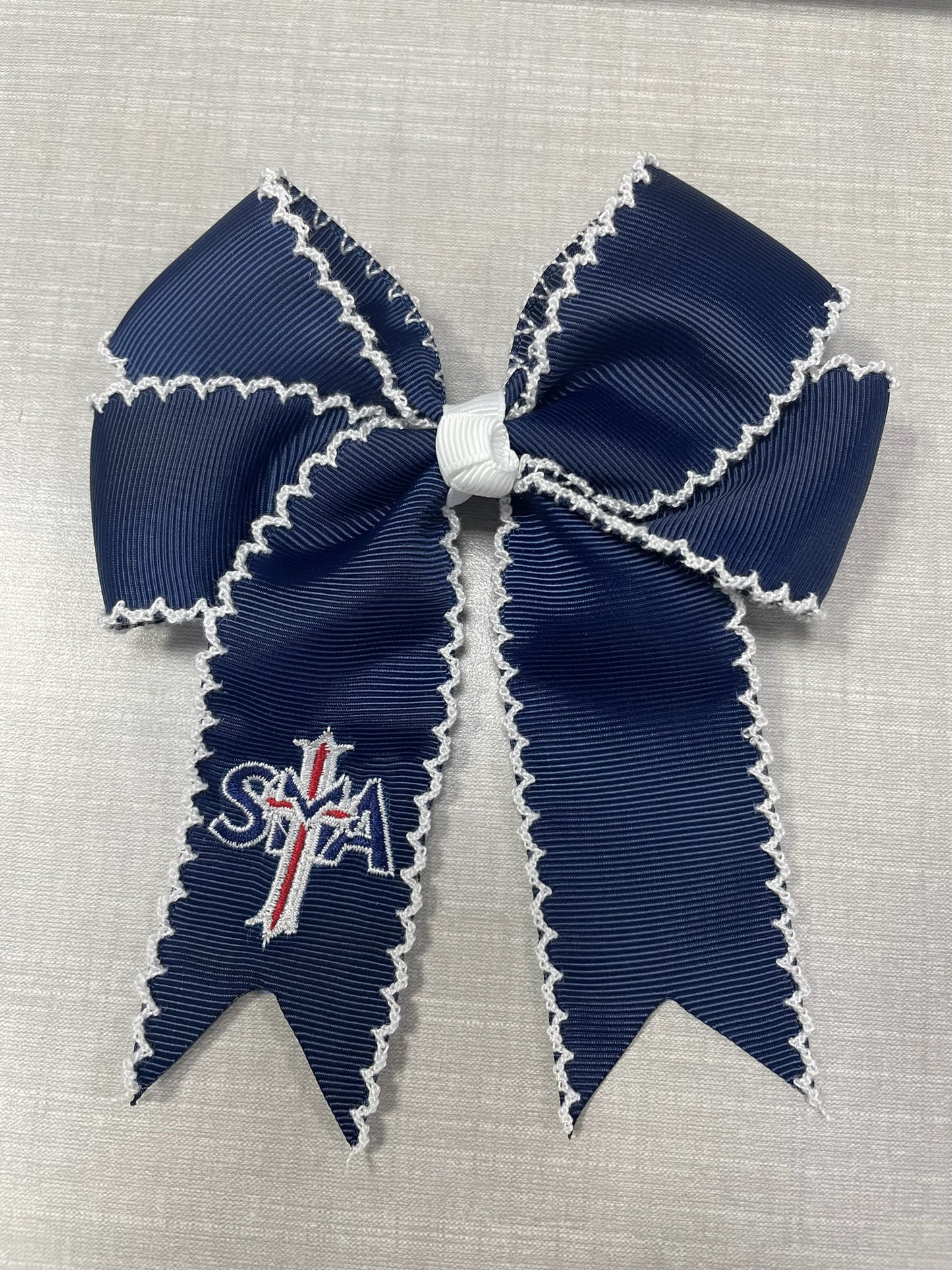 SMA embroidered bow