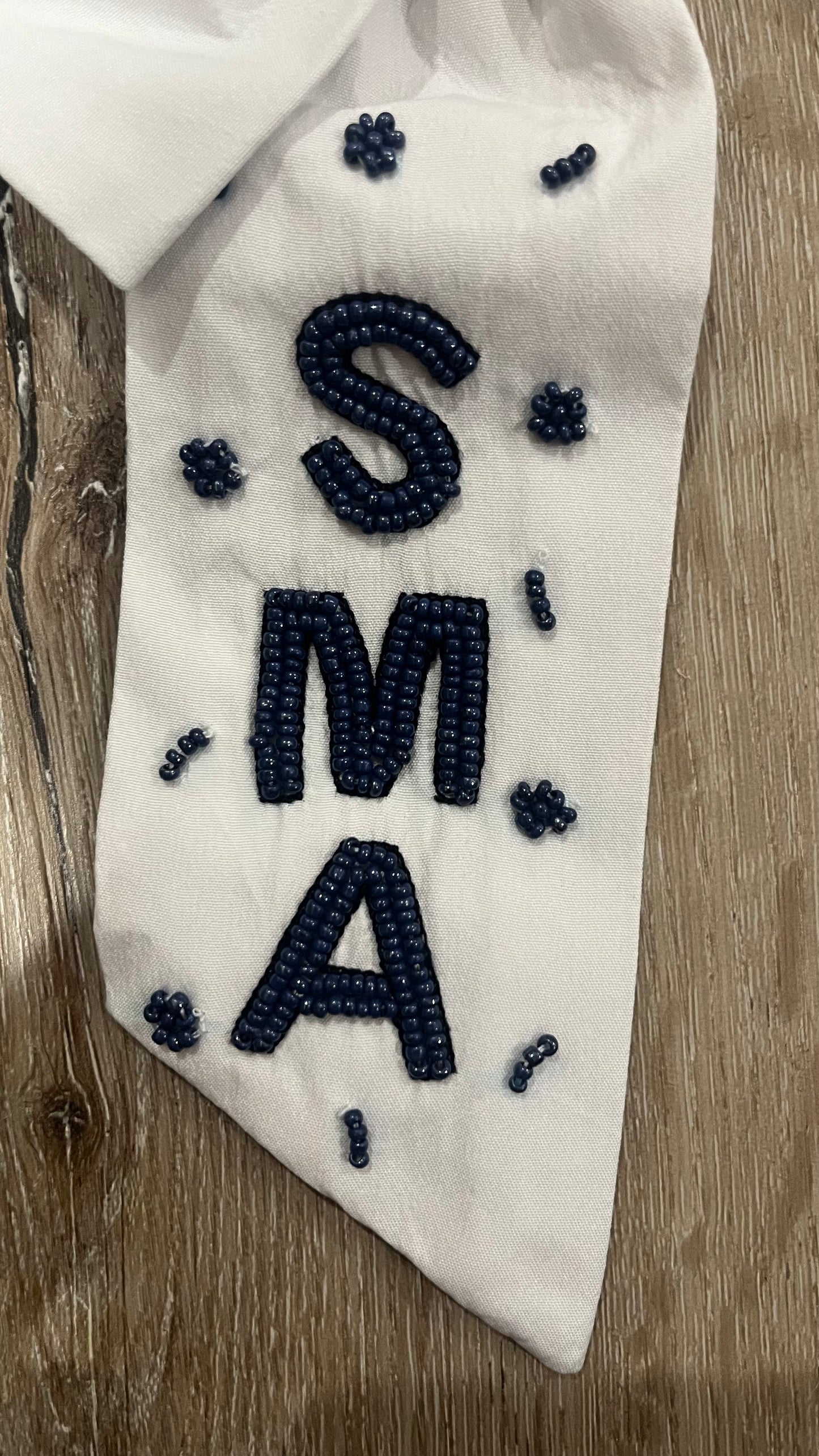 SMA hand beaded bow